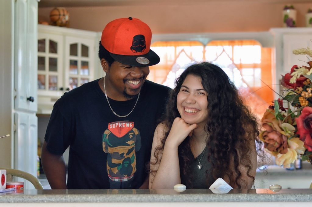 a man and woman posing for a picture