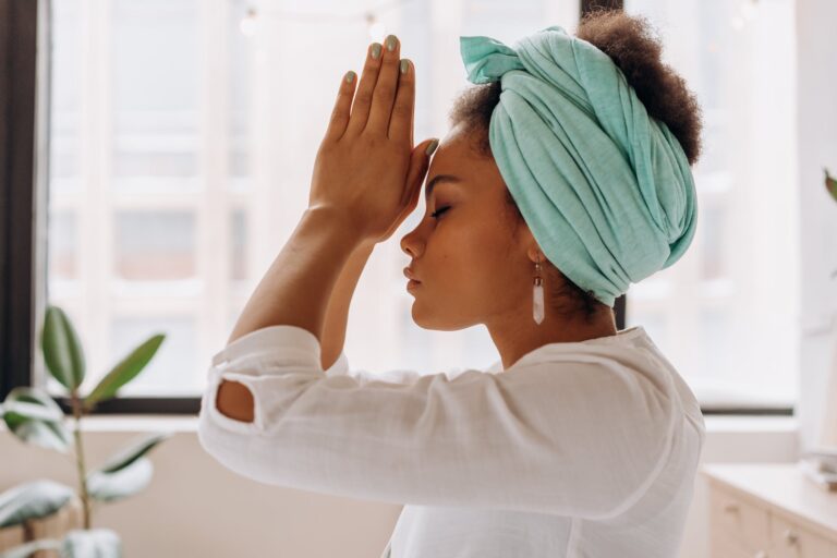 a woman holding her head