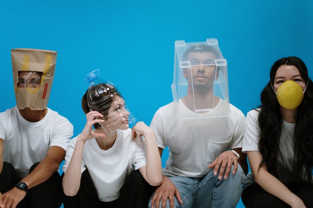 a group of people holding cups