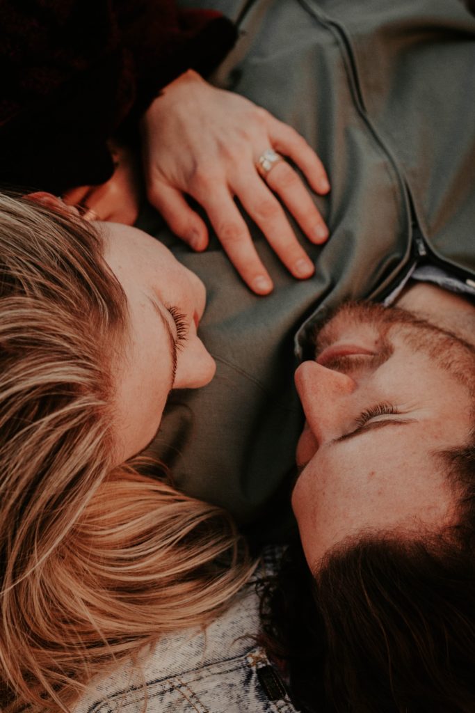 a man and woman kissing