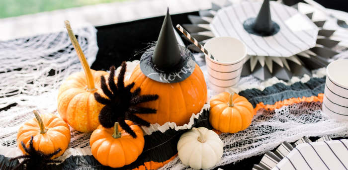 a group of carved pumpkins on a table