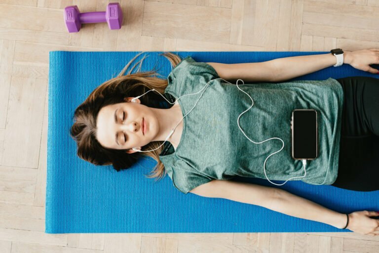 a person lying on a mat