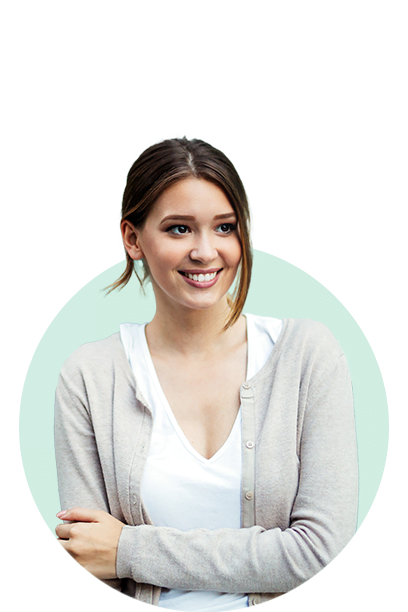 a woman smiling with her arms crossed