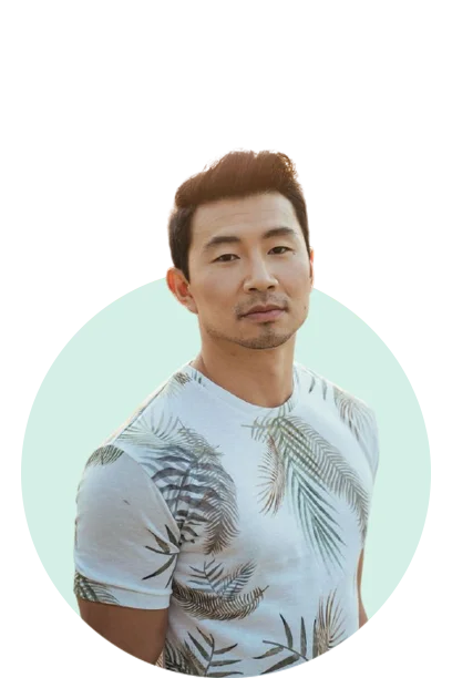 Simu Liu with a white shirt