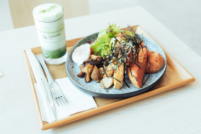 a plate of food and a glass of milk